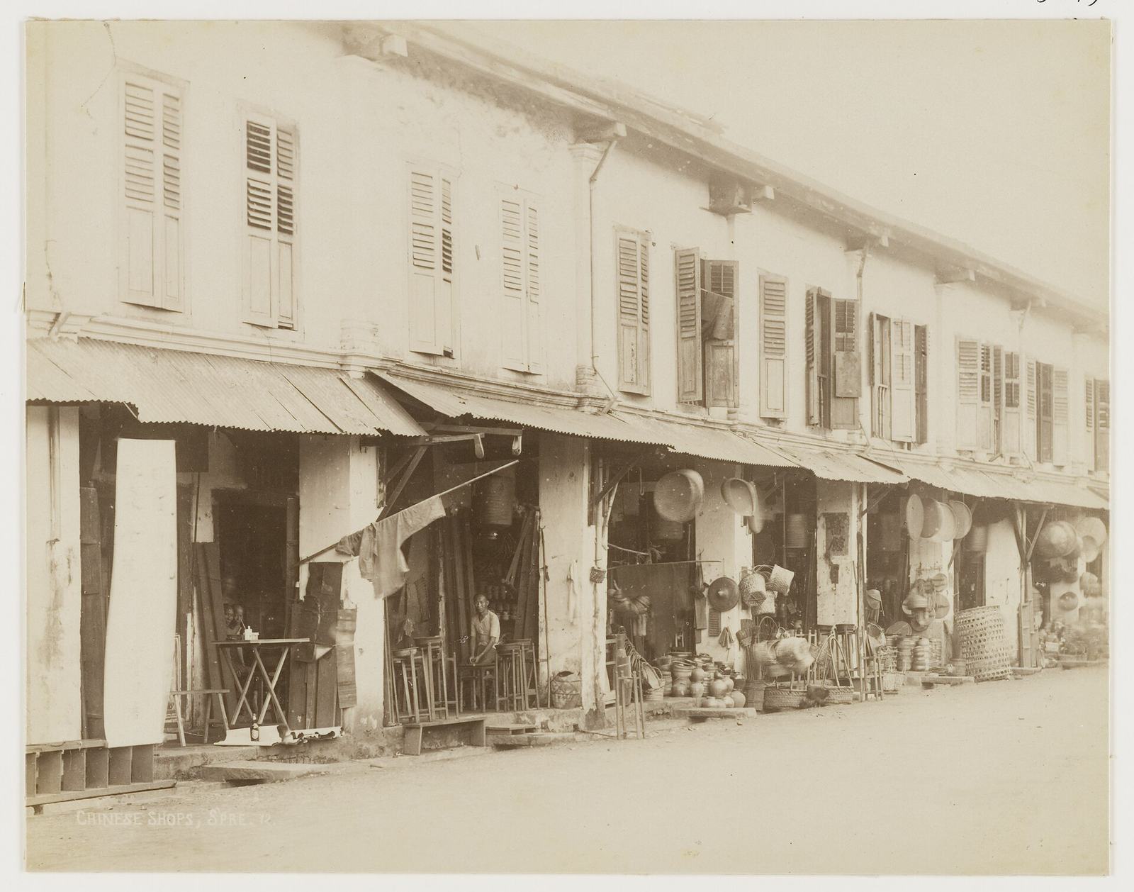 Small Chinese shops in Singapore in 1897.